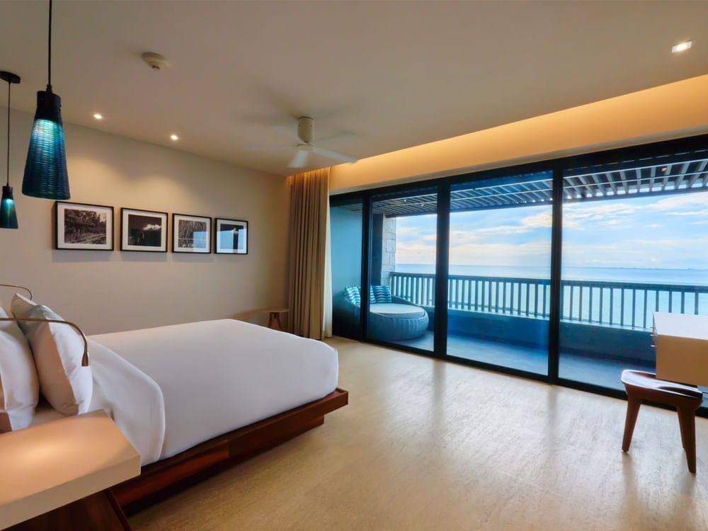 Cancun Premium Swim Up King — oceanfront balcony with lounger